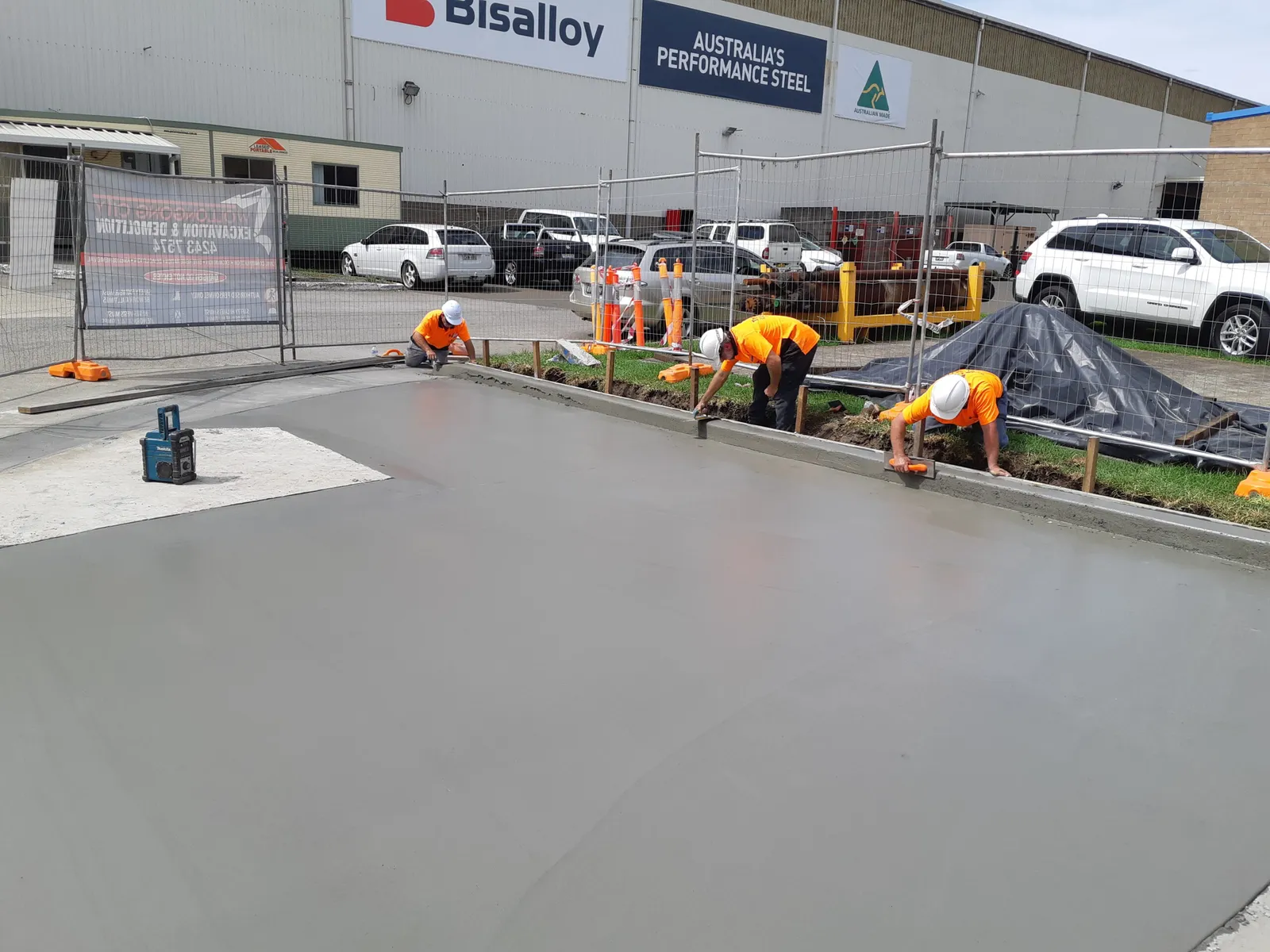 WCED civil construction crew laying concrete on an Illawarra commercial carpark